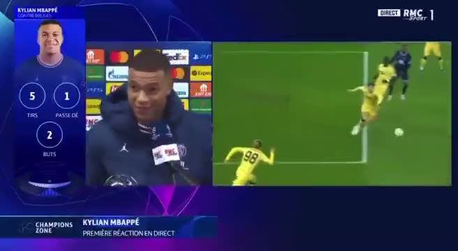 Kylian Mbappé est interviewé sur RMC Sport tandis que le replay montre son occasion manquée devant le but contre le Borussia Dortmund.