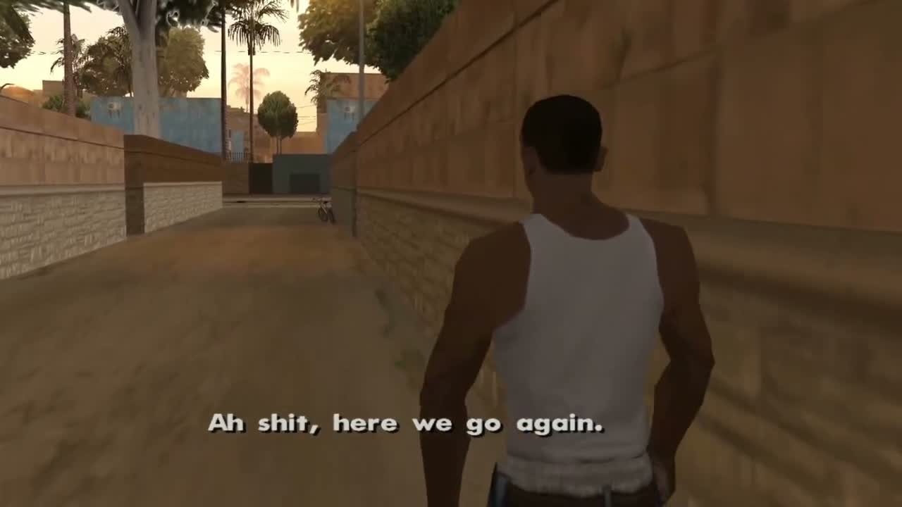 CJ avance dans une ruelle de Los Santos au début de GTA San Andreas avec la réplique culte Ah shit, here we go again en sous-titres.